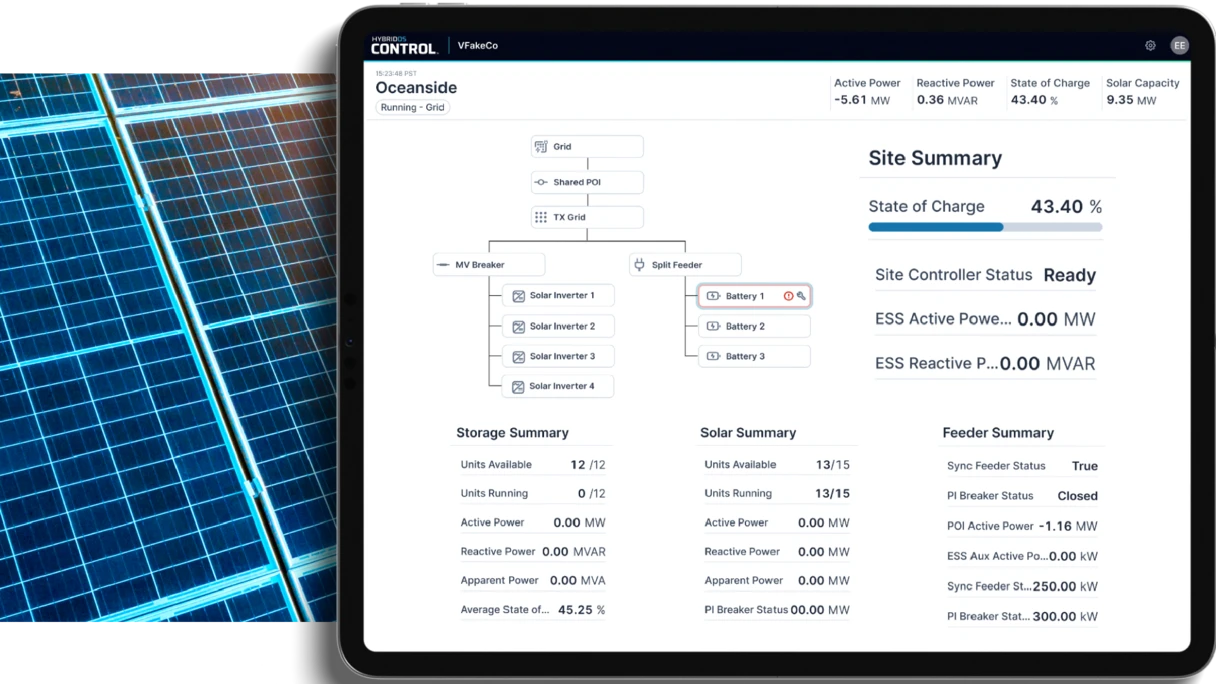 ipad screen with solar and battery asset data in front of solar panel